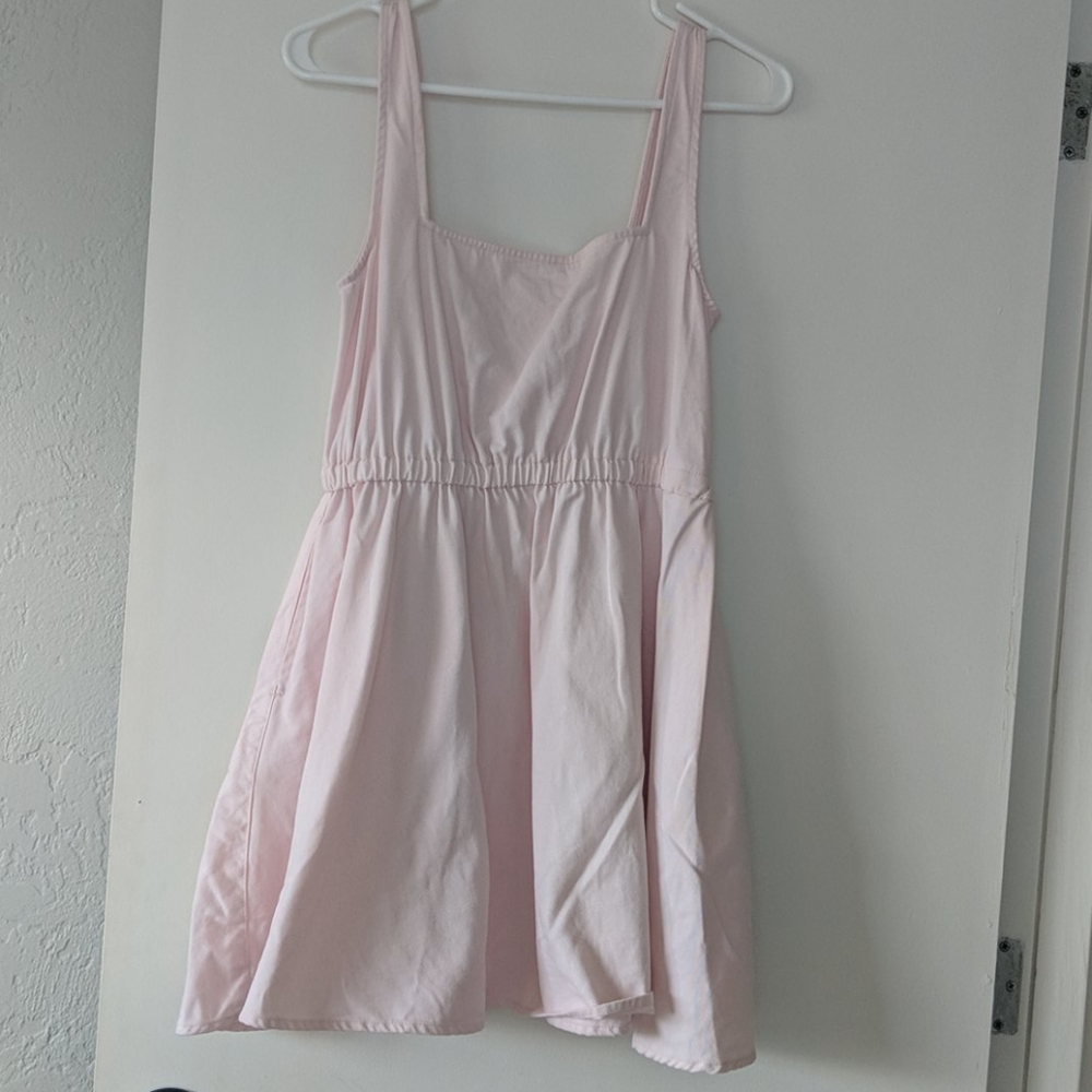 Pink denim skater dress with pockets